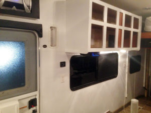 Toy Hauler Travel Trailer Renovations - Primer Coats on Cabinets and Walls
